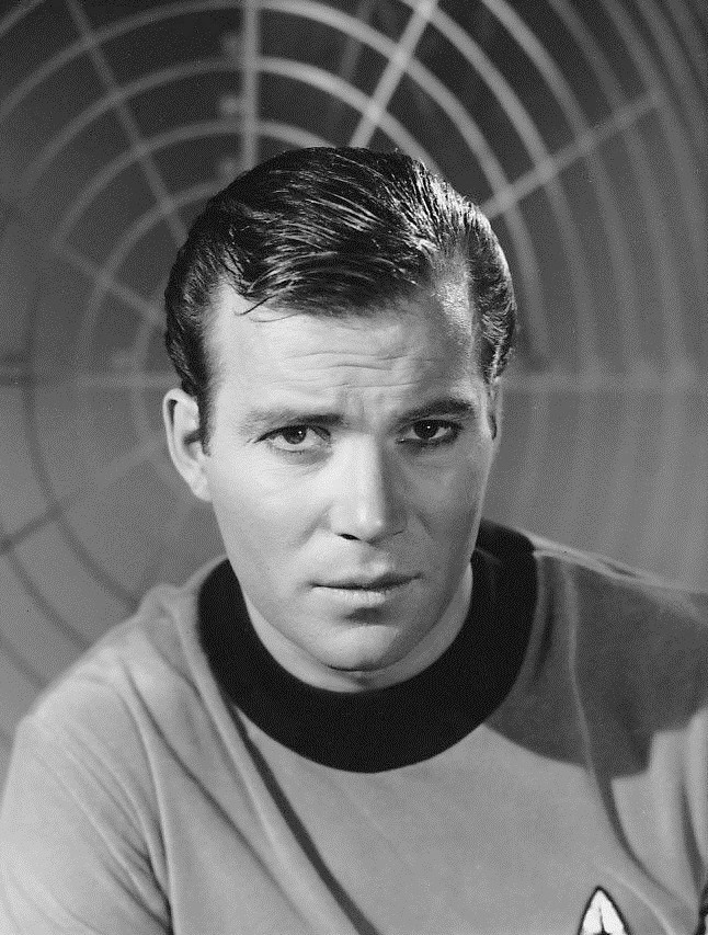 black and white promotional photo of William Shatner as Captain James T. Kirk