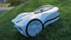 A closeup of a white and black robot lawnmower going up a grassy hill. It has two large wheels in back. It is a sleek design with a winged jet feel. There is a plastic oval half-bubble where the cockpit would be.