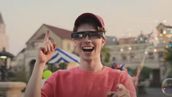 A person is wearing SUPERHEXA Vision dual camera AR glasses