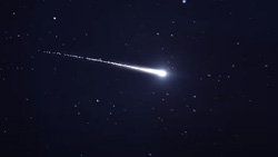 A close-up of a bright shooting star.