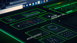 A closeup of a black desktop with flat touchscreen control modules with glowing green borders positioned vertically and horizontally. Each of the modules have different controls