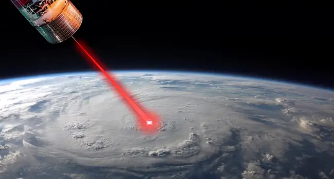 A satellite is emitting a laser aimed at the eye of a hurricane