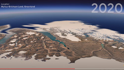 A satellite view of a large area of land partially covered in ice, Text in top right reads 2020.