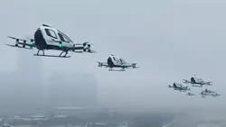 12 eHang EH216-S pilotless eVTOLs in flight